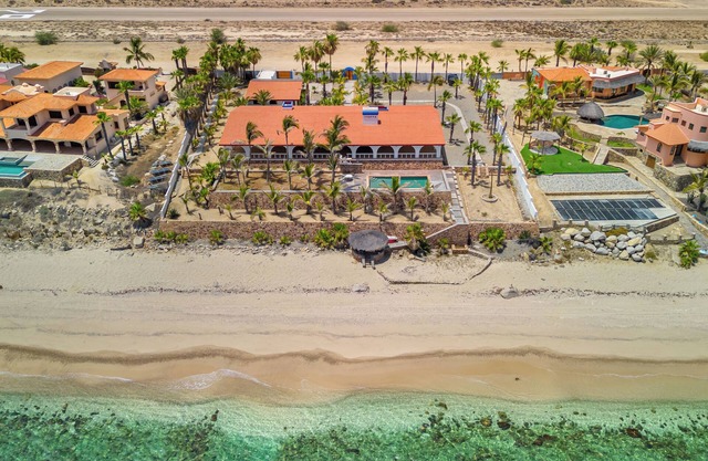 Secluded Beach Front Estate with a Large Pool, Family and Pet Friendly!