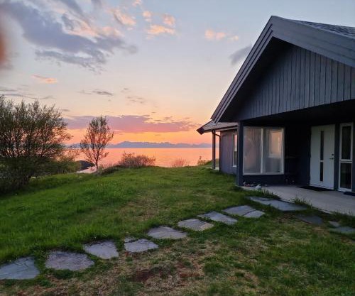 See Lofoten mountains midnight sun and nothern lights in Steigen