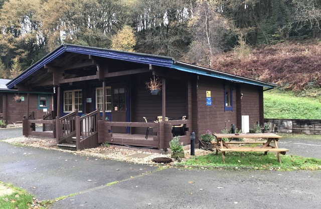 Self Catering Holiday Lodge set in 6 acres of wooded Hillside in South Wales