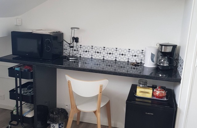 Self-contained attic room in secure building (6th floor)