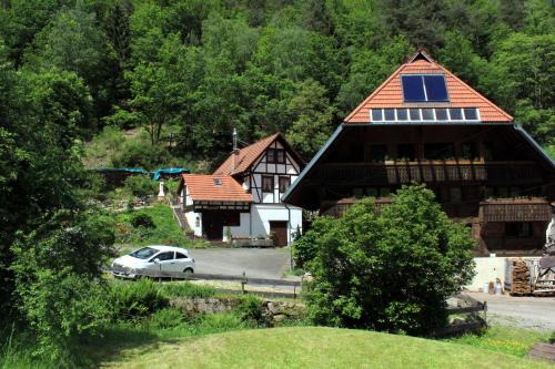 Separates Ferienhaus Speicherhäusle auf dem Hasenhof mit eigener Terrasse mit Grill, Kachelofen, WLAN