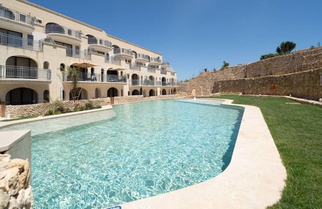 Serene Apt with Terrace & Pool & BBQ Access,Qala