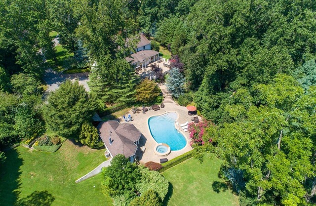 Serene Haven: Stunning Yard, Pool, and Views