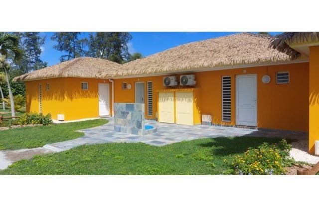 Set in a lush green area, your bungalow is a few steps from a natural beach.