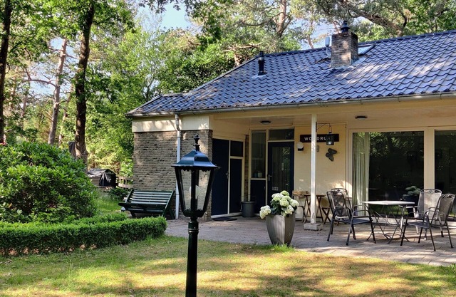 Sfeervol boshuis met jacuzzi en veel privacy.