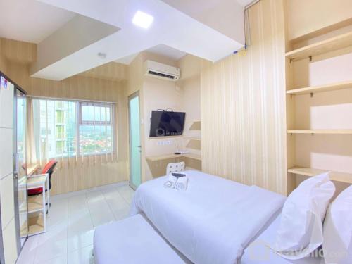 Simply Homey Studio at Stanford Jatinangor Apartment By Travelio
