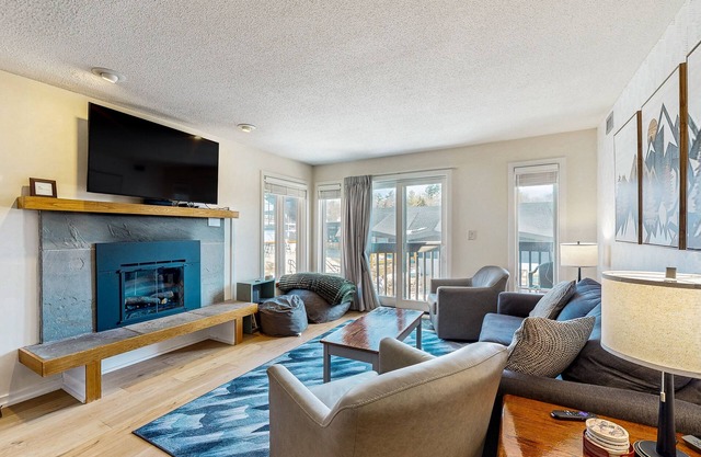 Ski-in/out mountainside condo w/mountain views, private deck, fireplace, w/d