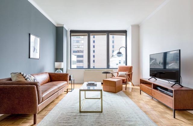 Smart Sutton Place 2BR w/Gym, Pool, near Central Park, by Blueground