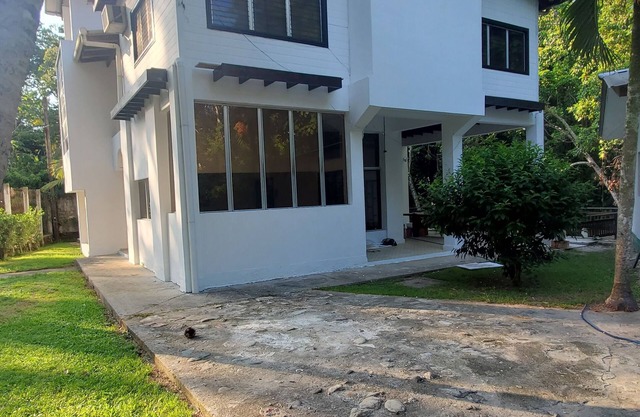 Spacious 2-story house with large green areas, swimming pool and close to the beach.