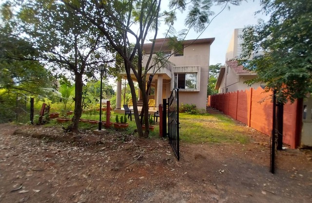 Spacious 3bhk Bungalow with Party Terrace, Porch seating and Clubhouse