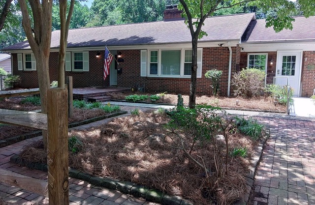 Spacious 4-bedroom house in charming Winston-Salem with WiFi and fenced in yard.