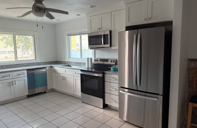 Spacious 5-bedroom beautiful water view home with private boat dock steps away.