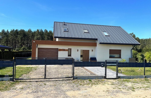 Spacious 5-bedroom villa next to the forest and a lake