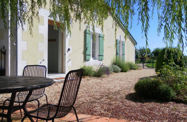 Spacious, double height, beamed main space. This gite is in a rural setting.