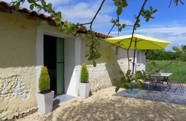 Spacious, double height, beamed main space. This gite is in a rural setting.