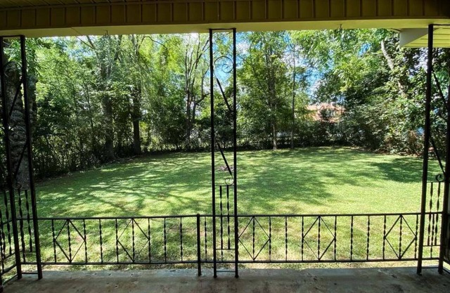 Spacious home in downtown Parsons! Conference room, HS internet, & private yard