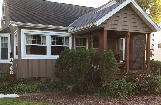 Spacious home with lake breezes and a community lake view!