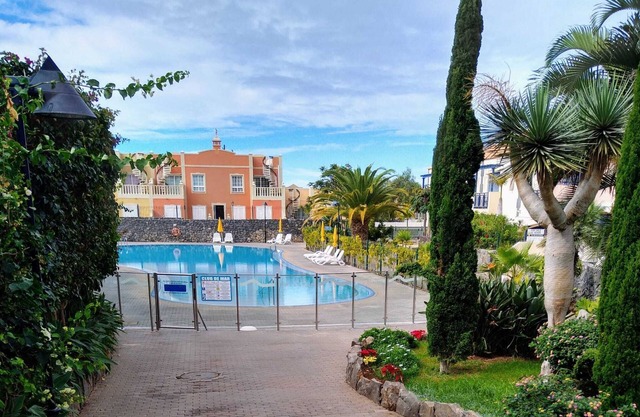 Spacious terraced house near the beach in a beautiful complex with heated pool
