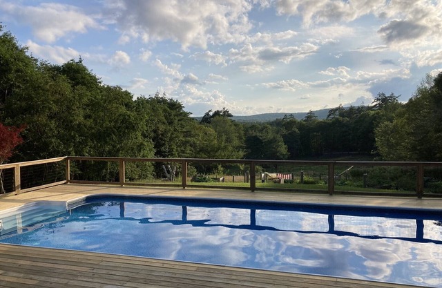 Spacious, unique home w/mountain views. Enjoy pool in summer, skiing in winter!