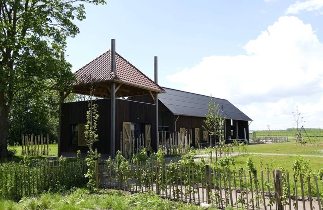 Stay in a romantic country style love suite with authentic trusses