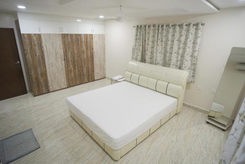 Stay Pride Service Apartments - AC Rooms in Vijayawada - Family & Business Stays