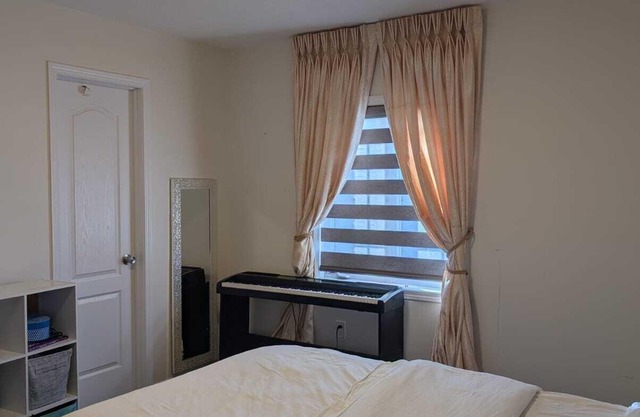 Steps to Heartland Town Centre! Cozy Home with a Huge Backyard