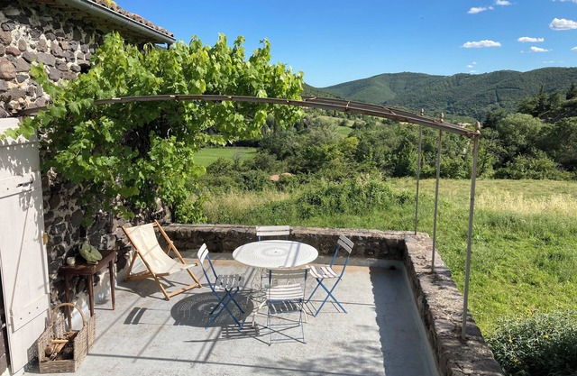 Stone barn in the middle of fields, village of Aubignas, Ardèche