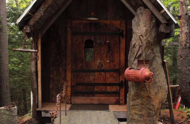 Stone Haven "Tent Cabin" with a cast iron fire pit in Canterbury, NH.