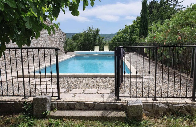 Stone village house with swimming pool and garden