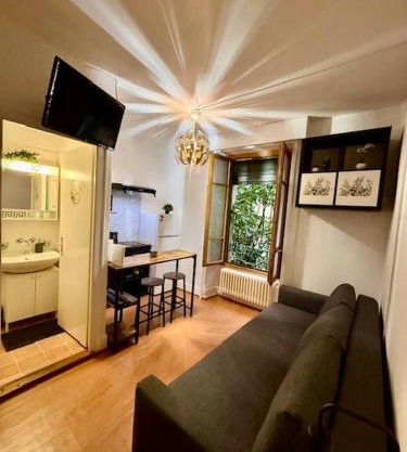 Studio moderne et chaleureux au coeur de Geneve - parfait pour courts sejours