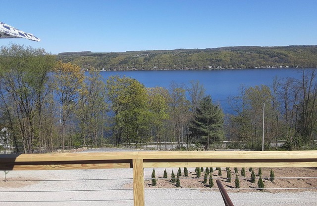 Stunning site with amazing decks, hot tub, walk to private beach on Keuka Lake!