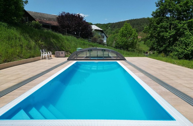 Stylish house on horse ranch in beautiful highlandsnwith saltwater pool.