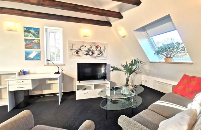 Stylish living in a 45m² attic apartment for 1-2 people