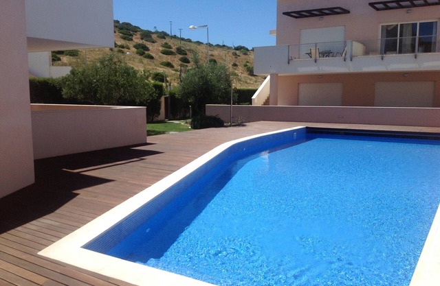 Sunny apartment with two large patio areas and views over open countryside