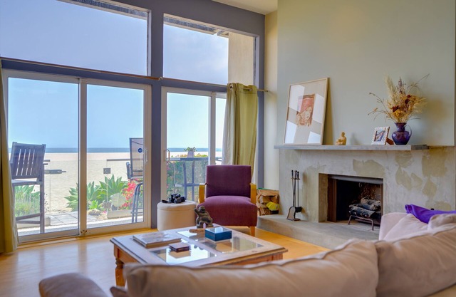 Sunsets and sweeping views, sliding doors open to the sand