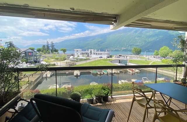 Superb apartment in small harbor with lake and marina views.