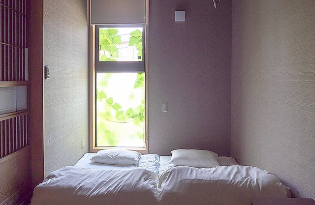 Tatami twin room with shower room and toilet / Katori Chiba