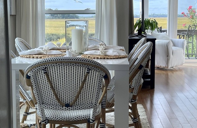 Tennis Courts in front and the ever changing Marsh in back. Golf cart included.