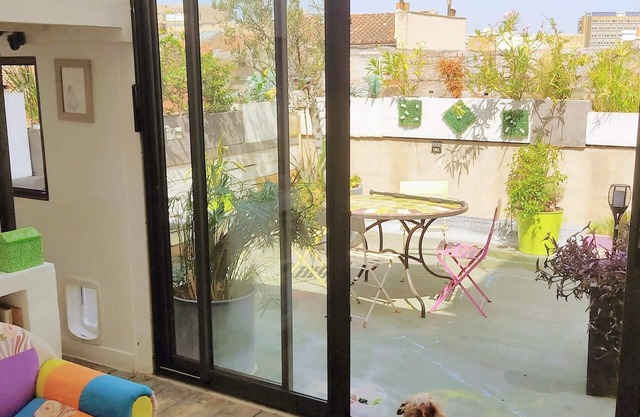Terrace and veranda: a garden on the 5th floor, atypical and cocooning.
