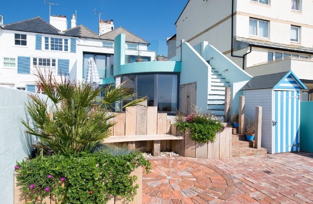 The Beach House at Sandgate Right on the beach