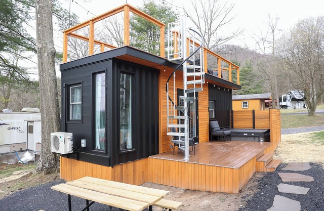 The Bellefonte Campground presents: The Luxury Hideaway Container Home, hot tub, Rooftop veranda, and more.