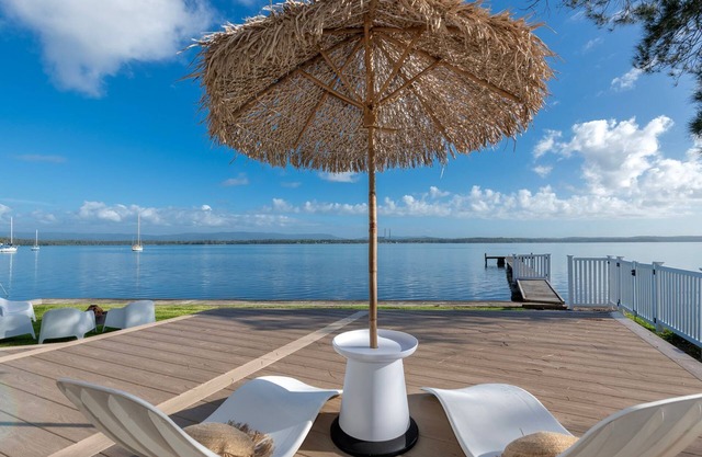 The Boathouse- Unwind at this tranquil, absolute waterfront, luxury Boathouse nestled on the edge of