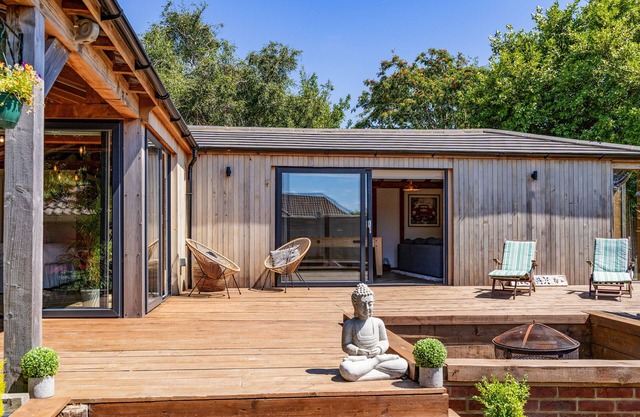 The Cabin - nestled within neatly landscaped gardens in the residential village of Hill Head