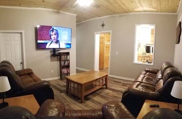 “The Depot” 2bedroom “3beds” 1 bath home. Outdoor party area with tv