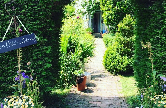 The ‘Hidden Cottage’, a quiet country retreat, overlooking field s and gardens.