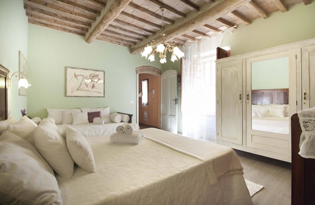 The house is located in the heart of Tuscany, in the historic center of San Gimignano.