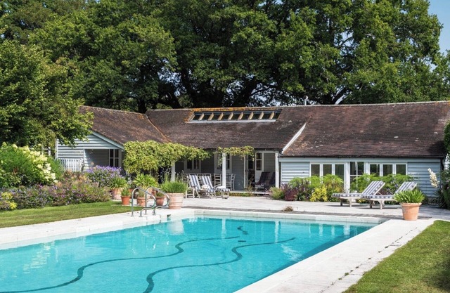 The Pool House - a delightful cabin with private pool bordering the South Downs.