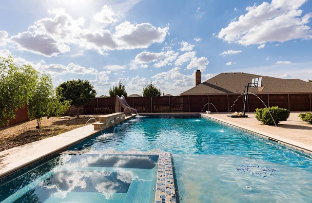The ultimate resort ranch style pool home on nearly a half acre!