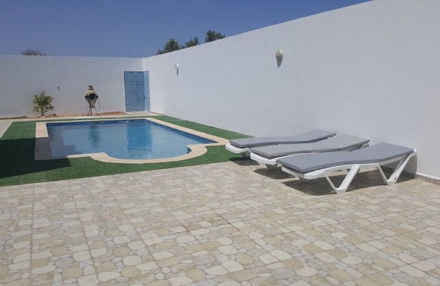The villa "DAR Sabrine" with its 100% swimming pool not overlooked, barbecue and shower