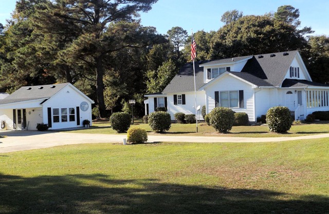 The Waterfield Place is a lovely 8 person home on 5 acres near the Outer Banks.